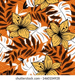 Trendy abstract seamless pattern with colorful tropical leaves and tsvetami on an orange background. Vector design. Jungle print. Flowers background. Printing and textiles. Exotic tropics. Fresh desig