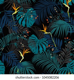 Trendy artistic dark summer tropical pattern with colorful and contrst exotic forest. Bright and original stylish floral background print, forest flower on black background. 