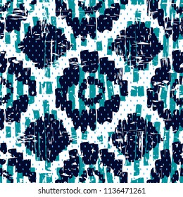 Trendy aztec vector seamless pattern. Tribal shabby wallpaper. Vertical direction of brush strokes.