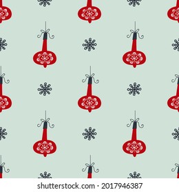 Trendy background with red christmas tree balls and snowflakes isolated on light blue. Christmas vector seamless pattern. Creative hand-drawn print for winter holidays. Xmas Design.