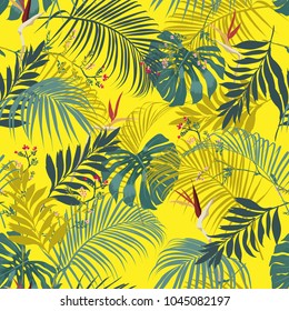 Trendy and beautiful fresh summer tropical forest leeves and flowers seamless vector pattern on vivid yellow colorful for fashion and all prints background.