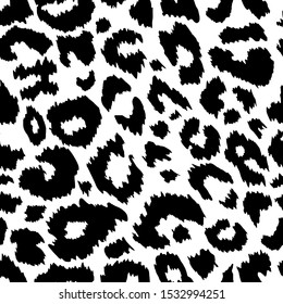 Trendy black and white Jaguar seamless pattern. Hand drawn fashionable wild animal skin texture for fashion print design, fabric, textile, wrap, background, wallpaper. Vector illustration