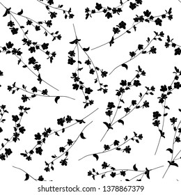 Trendy black and white vector texture. Monochrome floral seamless pattern. Fashion, fabric, ditsy print, wallpaper. Hand drawn silhouette wild flowers and leaves scattered random on white backgroud