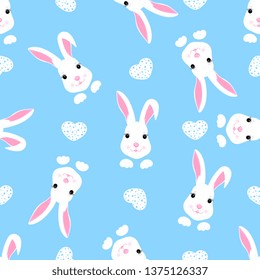 Trendy childish seamless pattern with cute Easter rabbit and hearts. Can be used for the decoration of the nursery, children's clothing, kids accessories, gift wrapping, digital paper.