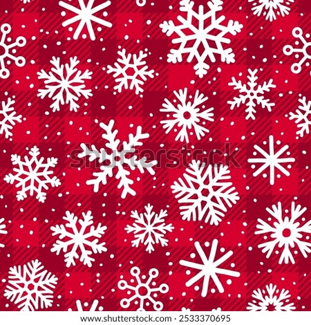 Trendy Christmas seamless pattern. Red Buffalo Plaid background with white winter snowflakes texture. Vector checkered plaid and snowfall print for fashion, fabric, wrapping paper, New Year decor.