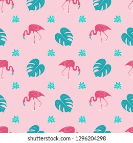 Trendy colorful exotical seamless pattern with pink flamingo, turquoise tropical plants on pink background
