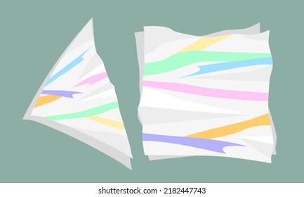 Multicolours print trendy colours highlighters on the creased square and triangle napkins on the green background. Top view.