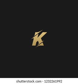 Trendy creative stylish sliced K black and golden color initial based letter icon logo