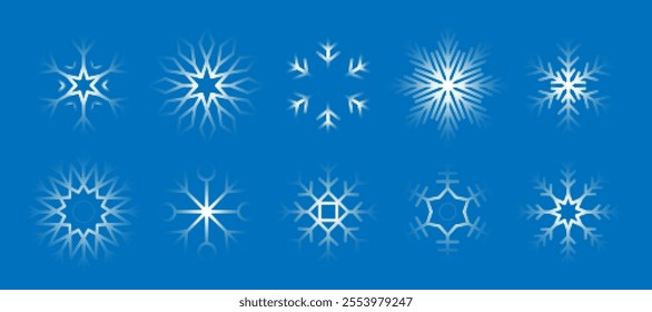 Trendy dotted snowflakes collection. Set of halftone dots elements isolated on blue backdrop