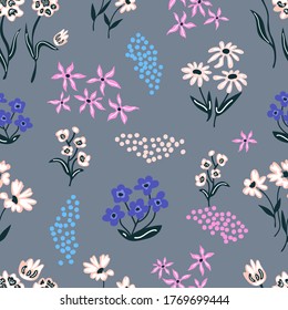 Trendy floral pattern on grey background. Vintage print with small inflorescences. Seamless vector pattern. Retro textile collection.