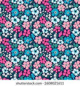 Trendy floral pattern in small abstract flowers. Liberty style. Pink, blue and white flowers. Floral seamless background for fashion prints. Vintage print. Seamless vector texture. Spring bouquet.