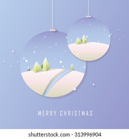 Trendy geometric minimalistic Merry  Christmas card design with hanging ornaments. Christmas landscape scenery with green trees, blue lake and white mountain hill top covered with snow