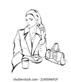 trendy girl drinking coffee and looking up