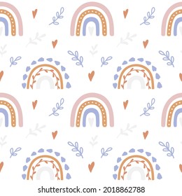Trendy hand drawn print with rainbow in Boho style. Vector seamless pattern with cute rainbows.