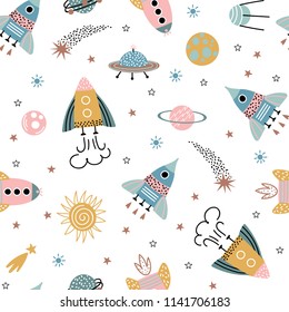 Trendy kids hand drawn a seamless pattern with planets and rockets. Baby vector background in a doodle style.