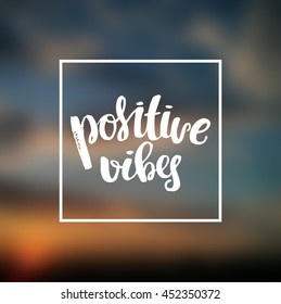 trendy lettering poster. Hand drawn calligraphy. concept handwritten against the sky at sunset  "positive vibes" creative graphic template
