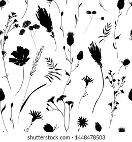 Trendy monochrome vector texture. Silhouettes blossom floral seamless pattern. Blooming botanical motifs scattered random. For fashion. Ditsy print. Hand drawn wild meadow flowers on white background