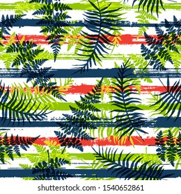 Trendy new zealand fern frond and bracken grass over painted stripes seamless pattern design. Caribbean jungle foliage clothing fabric print. Floral tropical leaves seamless design.
