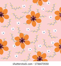 Trendy orange floral and tiny wildflower seamless pattern on pink background for fashion print. 