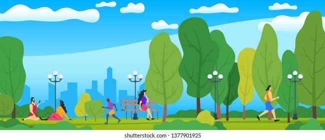 Trendy people relaxing in a beautiful city park, city skyline on the background