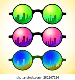 Trendy, round and vintage sunglasses with colorful lens reflect city sky view in summer