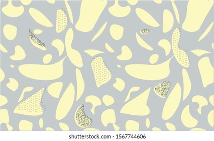 Trendy seamless abstract pattern terrazzo with yellow geometric objects and drops of cruskin on a yellow background. Bright and warm color palette. For printing on fabric, in the interior. eps 10