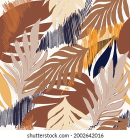 Trendy seamless autumn pattern in natural yellow and brown tones, abstract tropical palm leaves, hand drawn,  Fashionable template for design, packaging, wallpaper, for textiles, vector illustration.