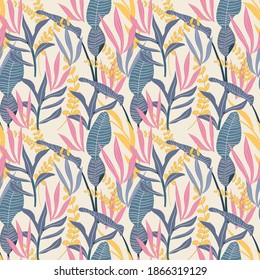 Trendy seamless background with tropical leaves. Bright jungle pattern with palm leaves and exotic plant. The elegant template with Hawaiian motifs