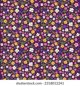 Trendy seamless botanical textile print.Small multi-colored flowers on a dark background seamless pattern for fabric, paper. Vector, hand drawn, Floral fashion pattern, ditsy print