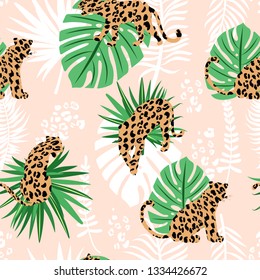 Trendy seamless exotic pattern. Composition with abstract silhouettes of leopards, tropical leaves and textures. Vector illustration for textile, fabric, wrapping paper, background, and packaging.