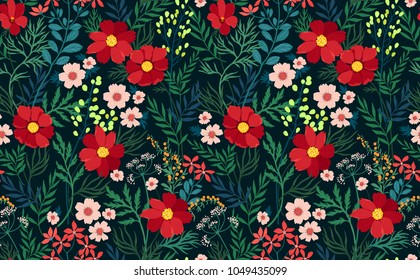 Trendy seamless floral pattern. Endless print made of  red flowers, leaves and berries. Summer and spring motifs. Modern floral texture. Dark blue background. Vector illustration.
