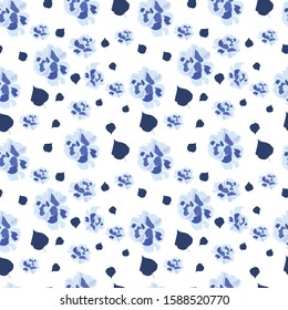 
Trendy seamless pattern with blue flowers and leaflets for printing on fabric.