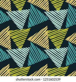 Trendy seamless pattern designs. Figures from striped triangles. Vector geometric background. Mosaic texture. Can be used for wallpaper, textile, invitation card, wrapping, web page background.