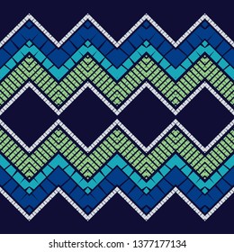 Trendy seamless pattern designs. Mosaic of zigzag with the old texture. Vector geometric background. Can be used for wallpaper, textile, invitation card, wrapping, web page background.