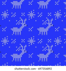 Trendy seamless pattern with embroidered snowflakes and deer.
