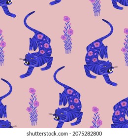 Trendy seamless pattern with folk art crawling tigers. Bohemian fabric design. Colorful exotic floral wallpaper or gift wrap.
