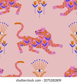 Trendy seamless pattern with folk art tigers and flowers. Bohemian fabric design. Colorful exotic floral wallpaper or gift wrap.