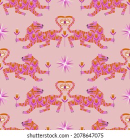 Trendy seamless pattern with folk art tigers. Bohemian fabric design. Colorful exotic floral wallpaper or gift wrap.