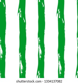 Trendy seamless pattern. Stylish vertical strip. Brush strokes, stains. Interesting textures. Hand drawing, background. White and green