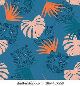 Trendy seamless pattern with Tiger with colourful tropical leaves vetor EPS10,Design for fashion , fabric, textile, wallpaper, cover, web , wrapping and all prints on deep blue background