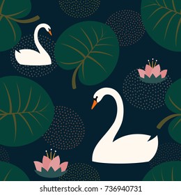 Trendy seamless pattern with white swans, water lily and leaves on dark blue background. Night lake art background. Fashion design for fabric, wallpaper, textile and decor.