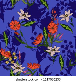 Trendy seamless pattern with wild flowers and leaves on a blue background. 