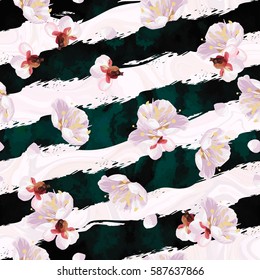 Trendy seamless spring pattern with blossom plum tree's flowers and art stroke stripes. Marble textured vector backdrop.