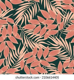 Trendy seamless tropical pattern with bright plants and leaves on a green background. Summer colorful hawaiian seamless pattern with tropical plants. Seamless exotic pattern with tropical plants.