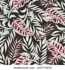 Trendy seamless tropical pattern with bright plants and leaves on a dark background. Tropic leaves in bright colors. Printing and textiles.  Hawaiian style. Floral background. 