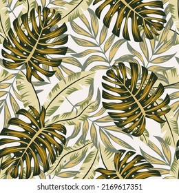 Patrón tropical a la moda sin fisuras con plantas brillantes y hojas en un fondo blanco. Papel tapiz de la jungla exótica. Impresión y textiles.  Botánica tropical.