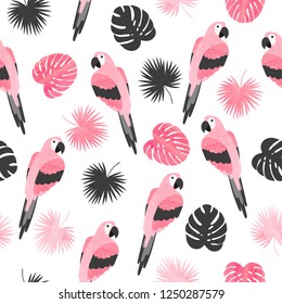 Trendy seamless tropical pattern with pink watercolor parrots and palm leaves.