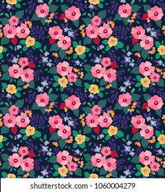 Trendy seamless vector floral pattern. Endless print made of small pink flowers, leaves and berries. Summer and spring motifs. Dark blue background.Vector illustration.