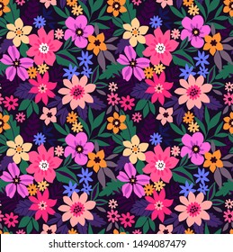 Trendy seamless vector floral pattern. Endless print made of small colorful flowers, leaves and berries. Summer and spring motifs. Dark blue background.Vector illustration.