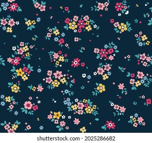 Trendy seamless vector floral pattern. Endless print made of small colorful flowers. Summer and spring motifs. Black background. Stock vector illustration.